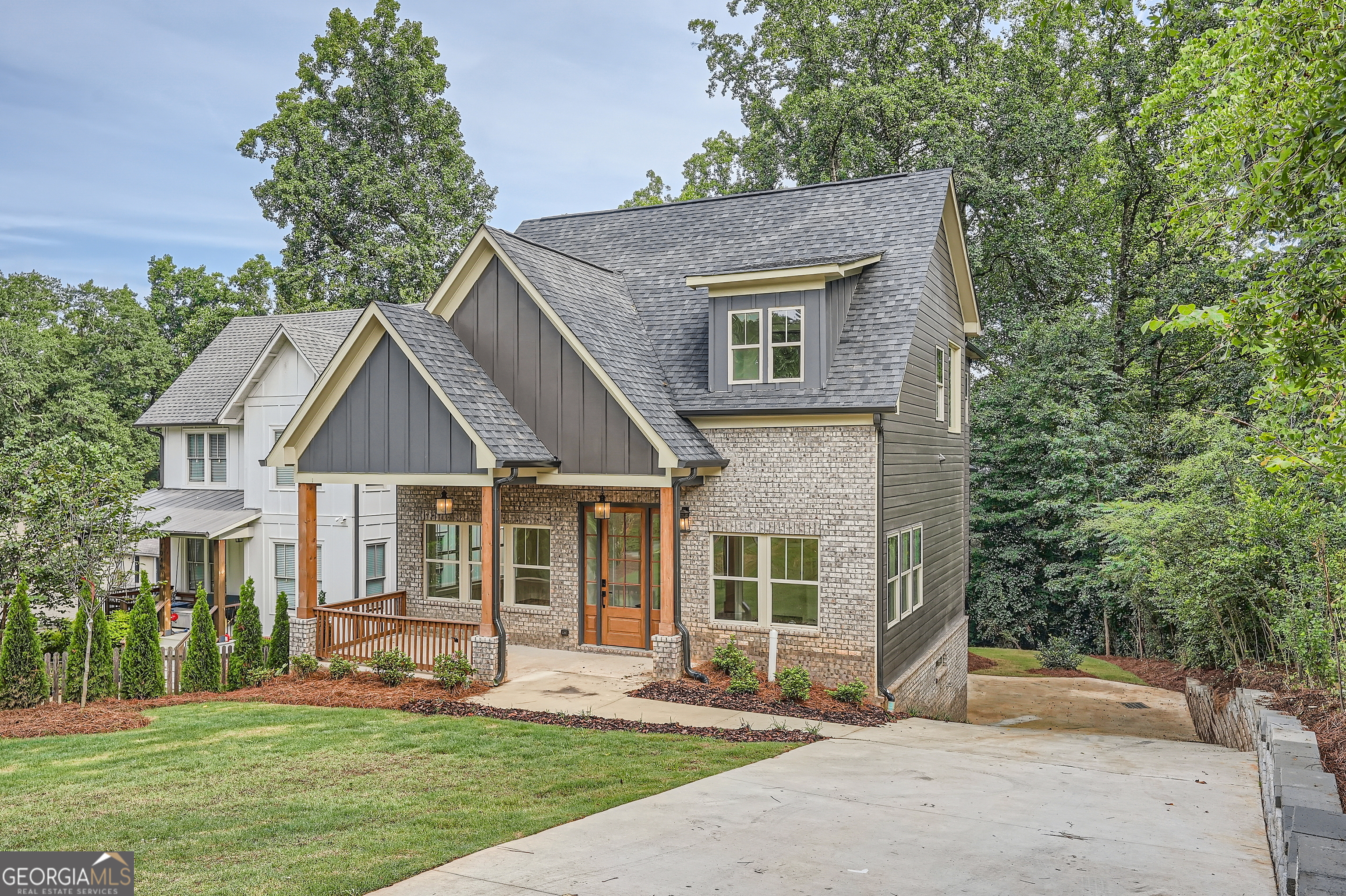 front view of a house with a yard