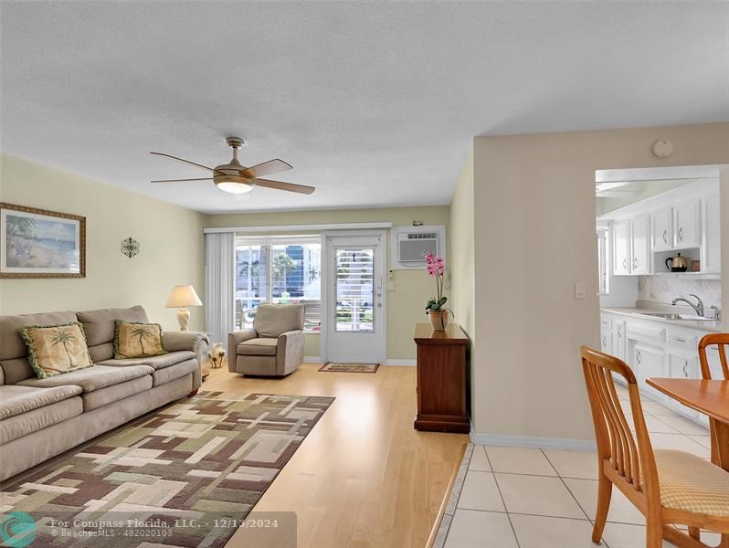 So Comfortable, Relaxing and WOW THE VIEWS, BRAND NEW AC Sept. 2024! Adjacent to your Living Room is Your Large Dining Area which has a Dimmer Switch and the Kitchen. Great for Entertaining or Just a Quiet Night In! BEING SOLD FURNISHED, AS-IS.