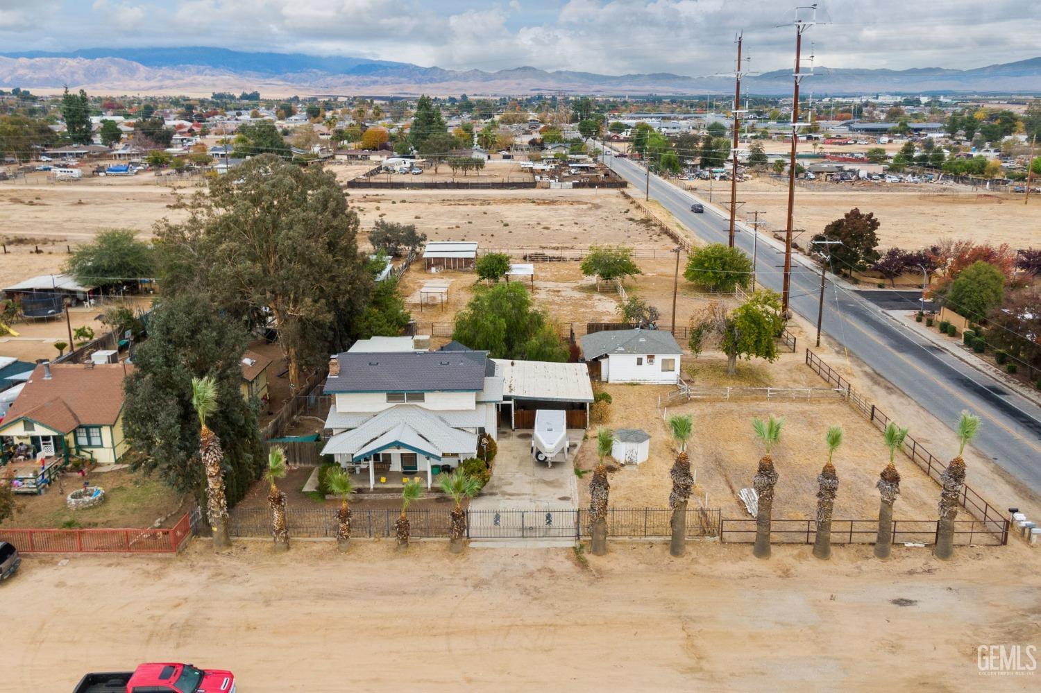 a view of a city with lawn chairs