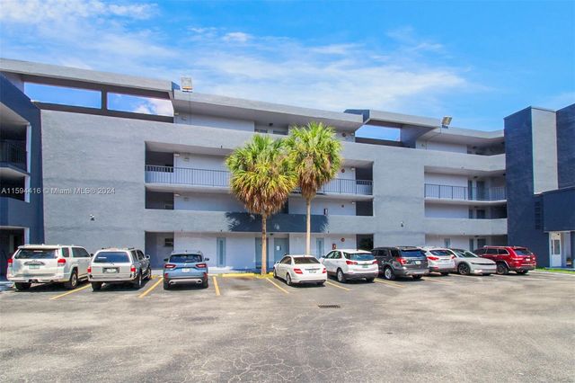 $240,500 | 110 Fontainebleau Boulevard, Unit 104 | The Greens