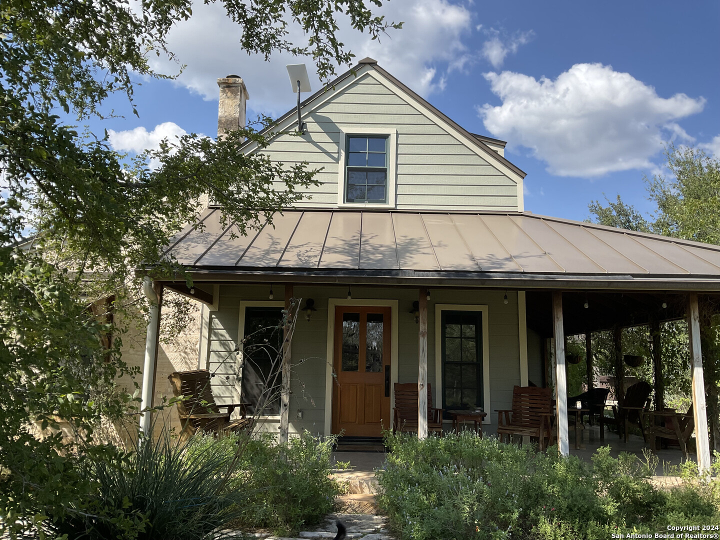 a house view with a garden space