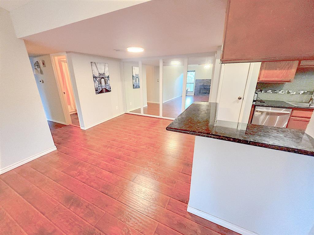 a view of livingroom with furniture and wooden floor