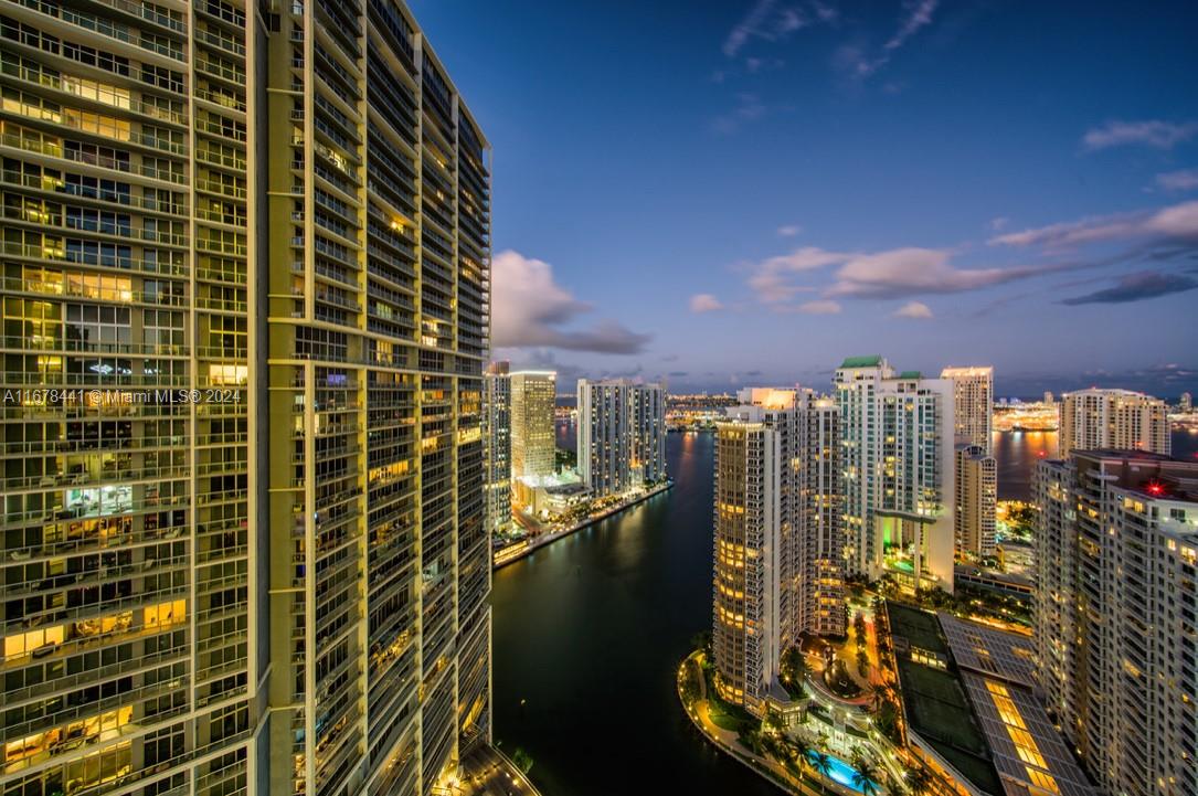 a view of a city with tall buildings