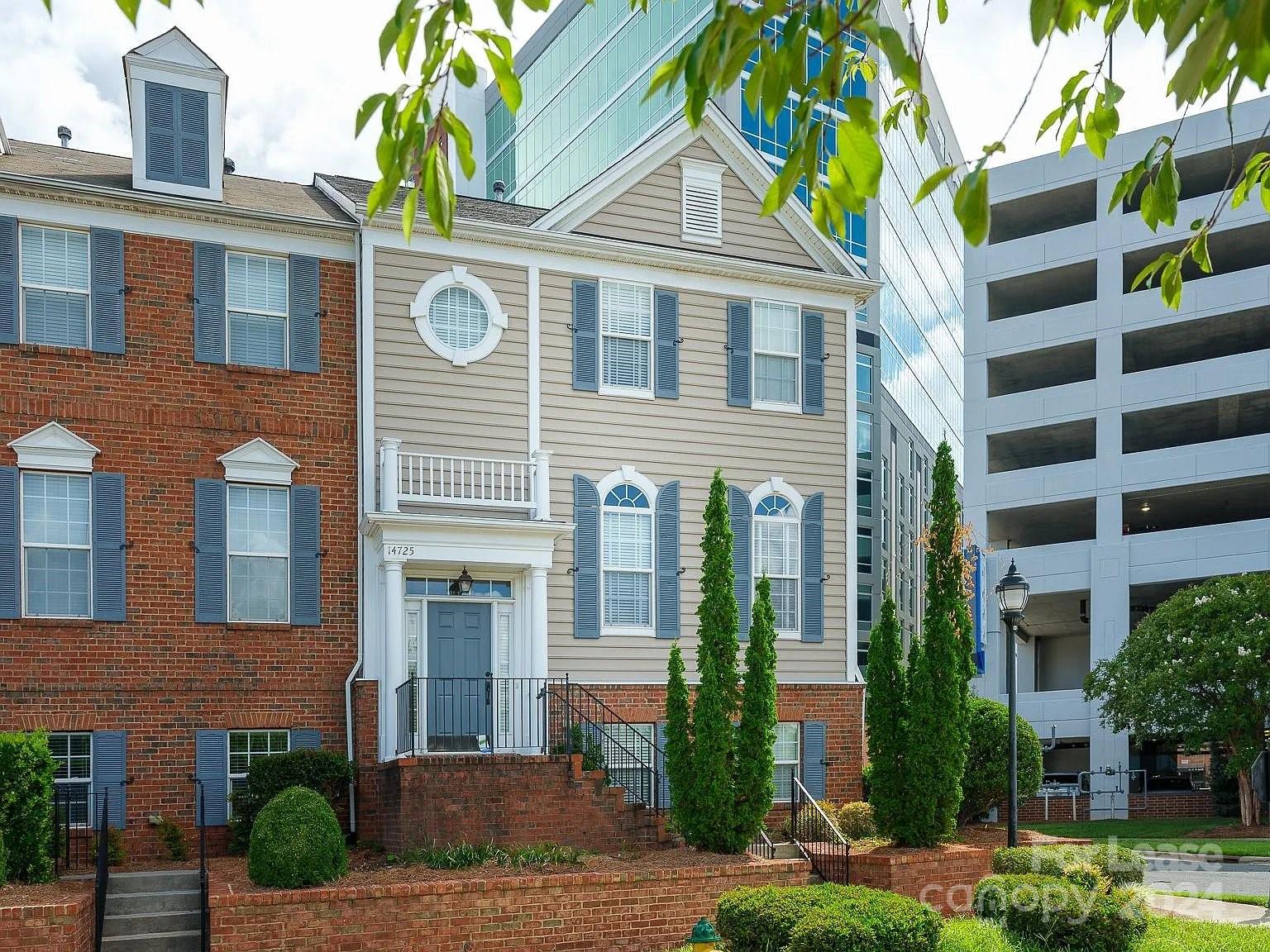 a front view of a multi story residential apartment building