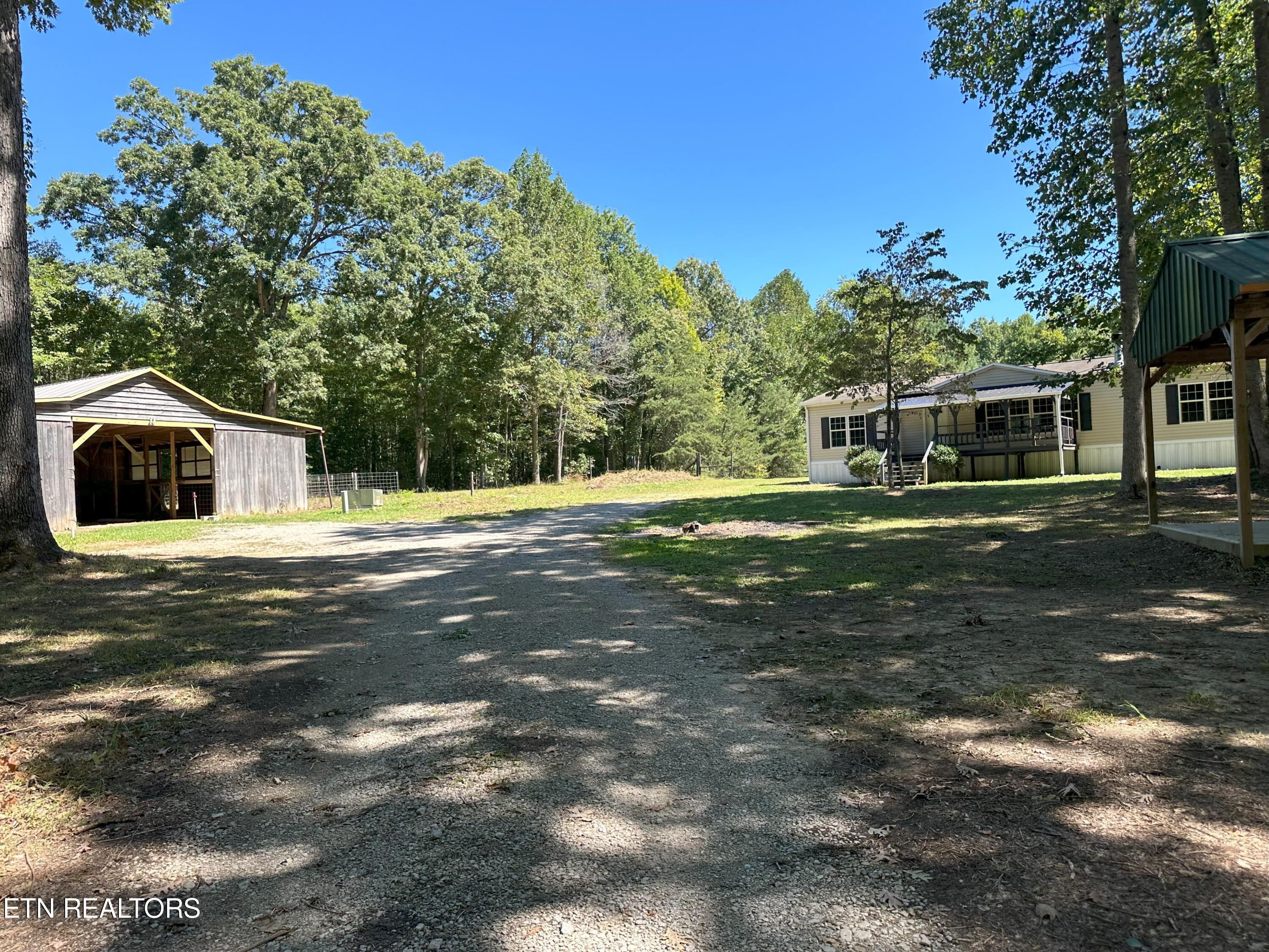 Home with barn and outbuildings