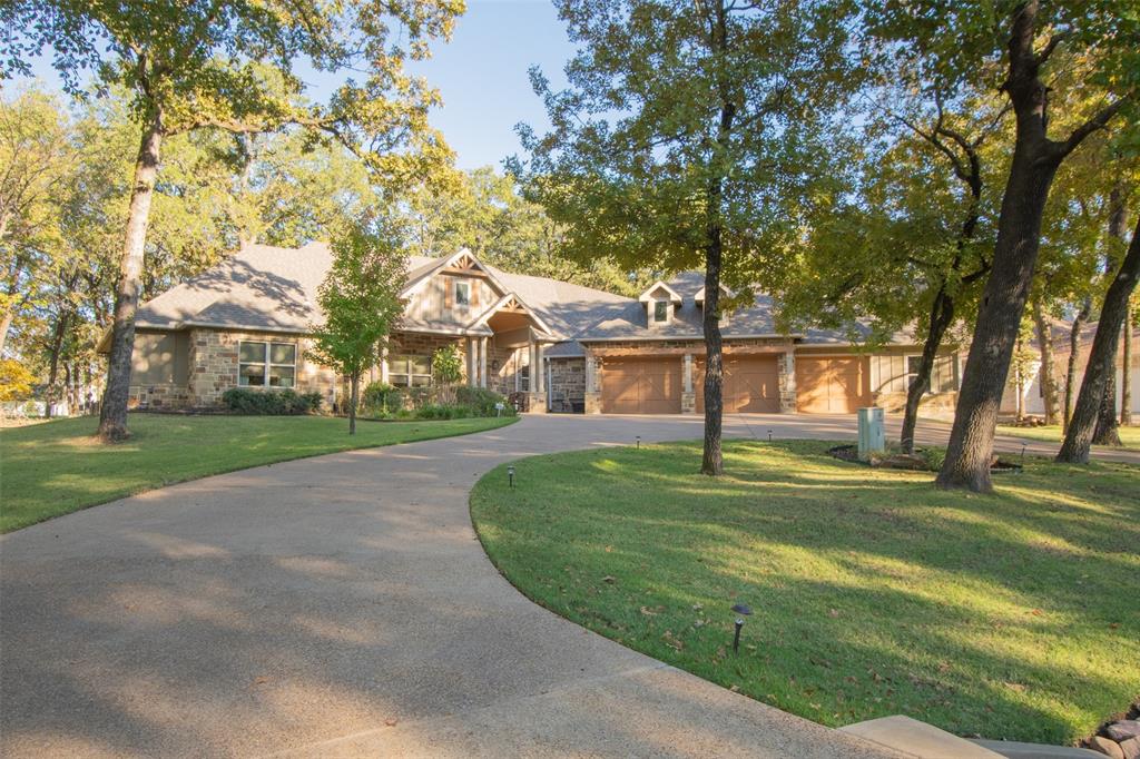 front view of a house with a big yard