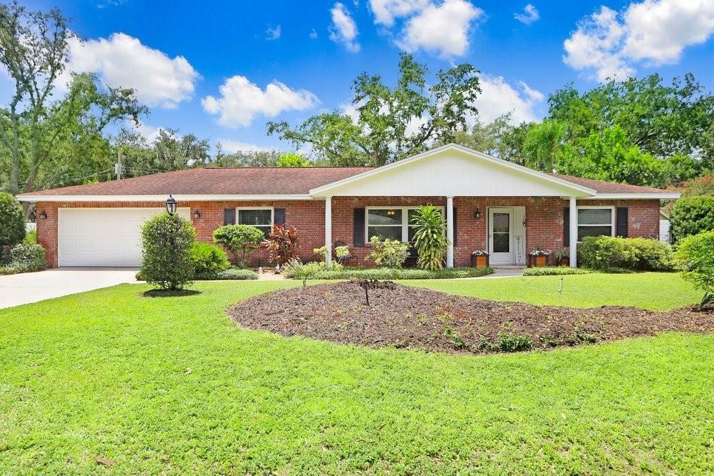 a house with garden in front of it