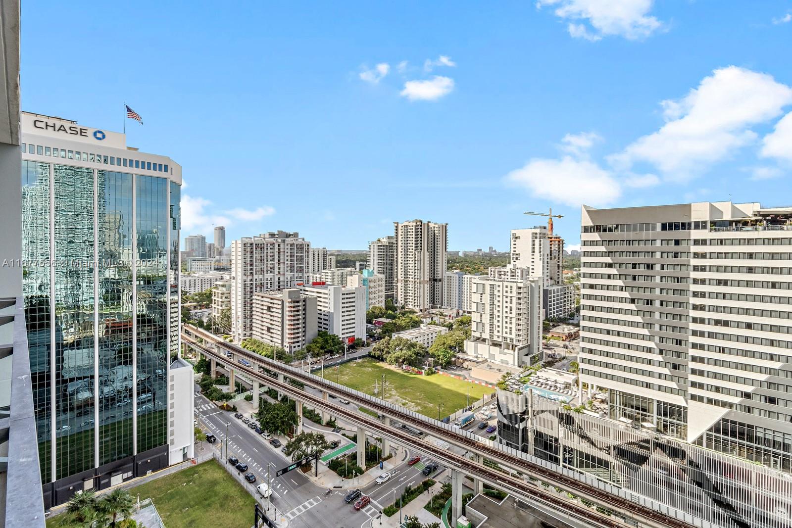 a view of a city with tall buildings