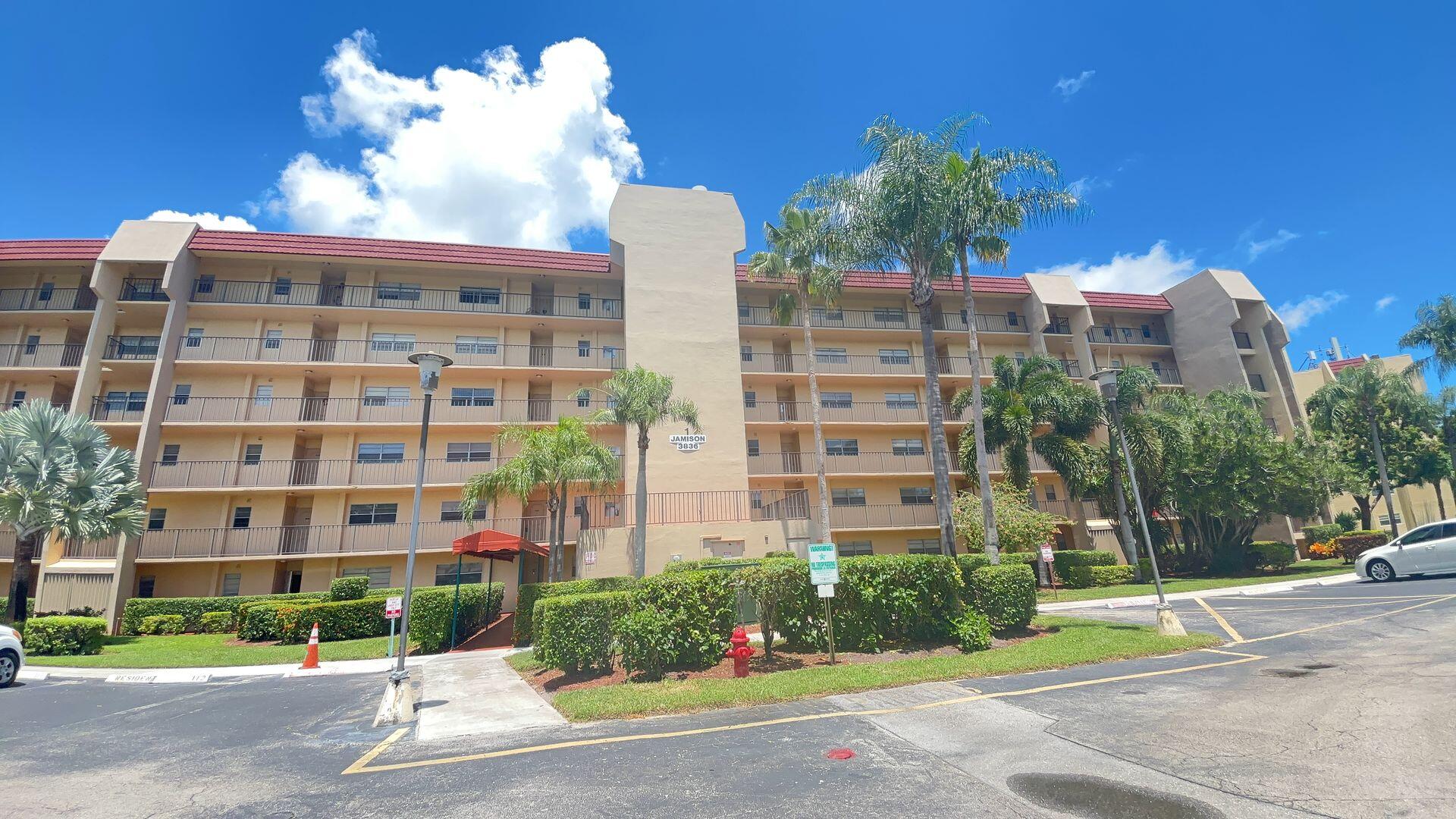 a view of a building and a yard