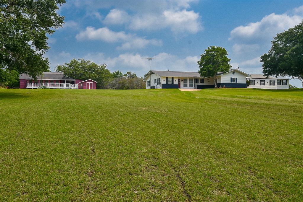 a view of a house with a big yard