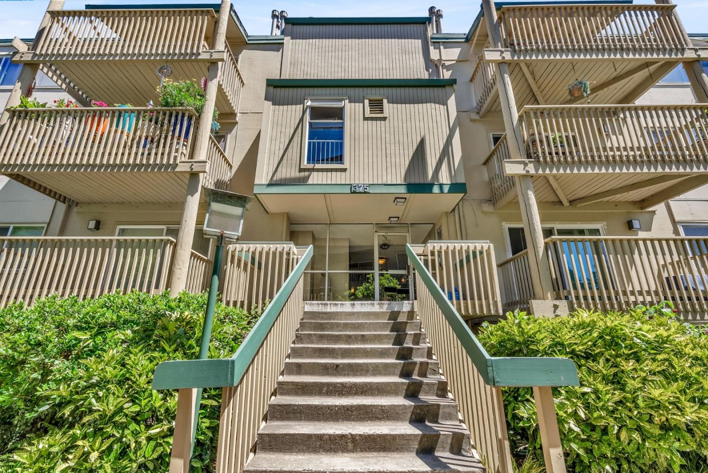 a balcony with a garden area