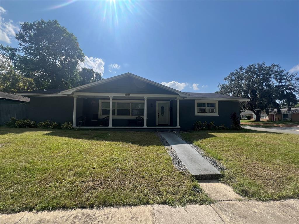 front view of a house with a yard