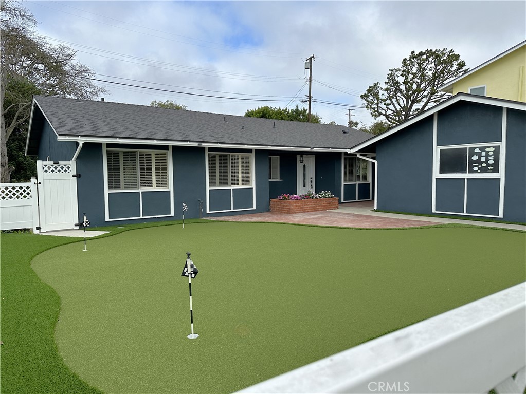 a view of a house with a swimming pool