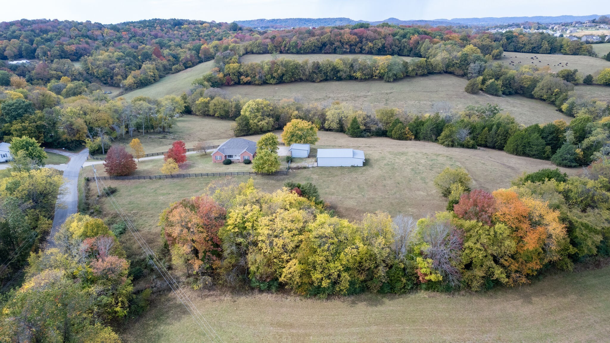 an aerial view of a house with a garden