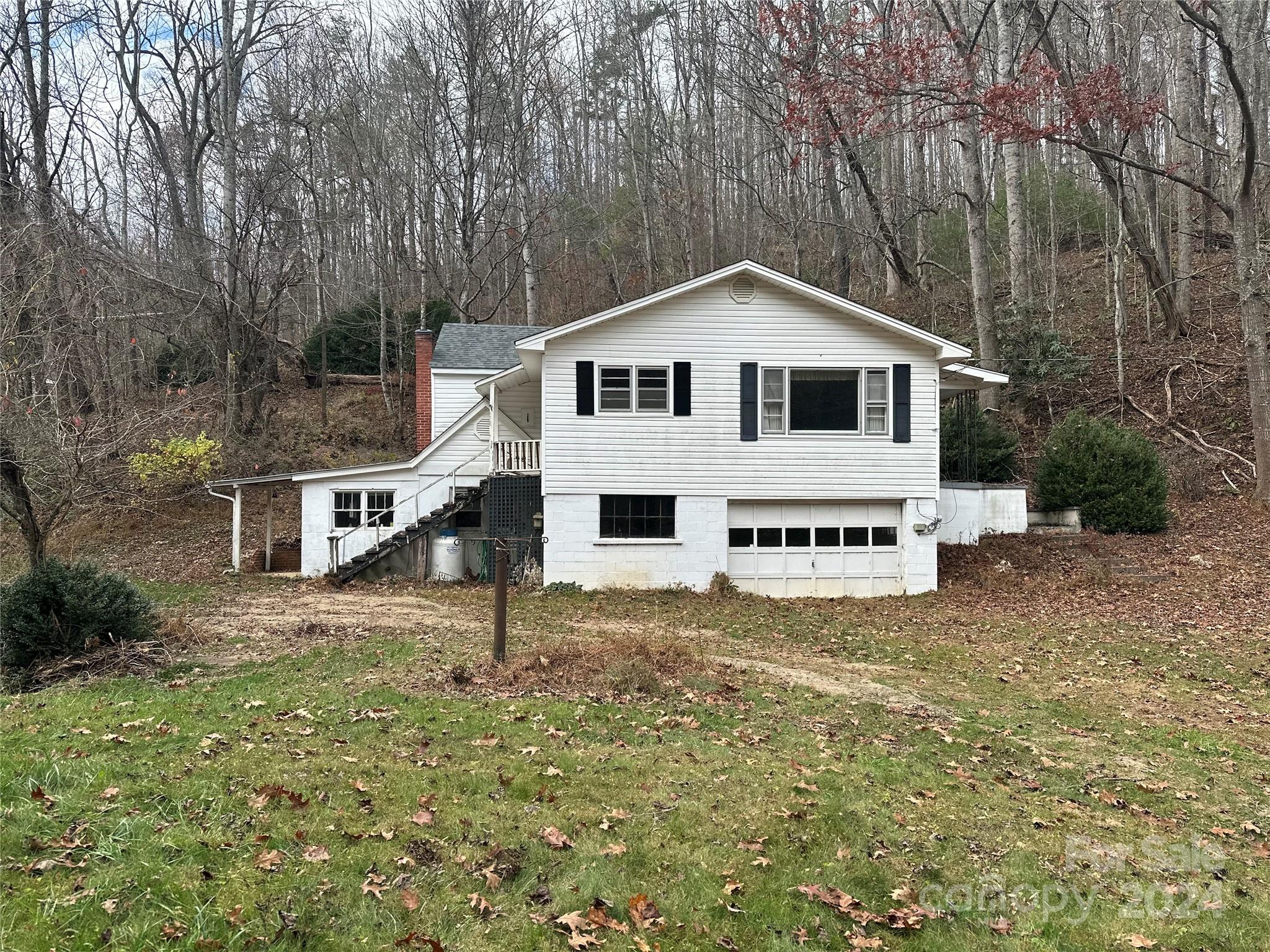 a house with trees in front of it