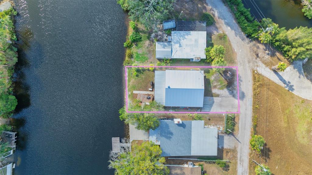 an aerial view of a house with a garden