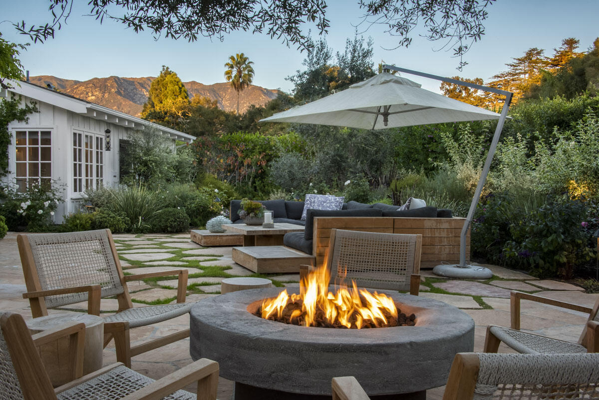 swimming pool view with a seating space