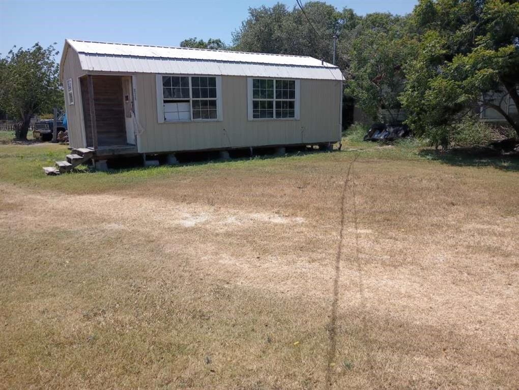 a front view of a house with garage