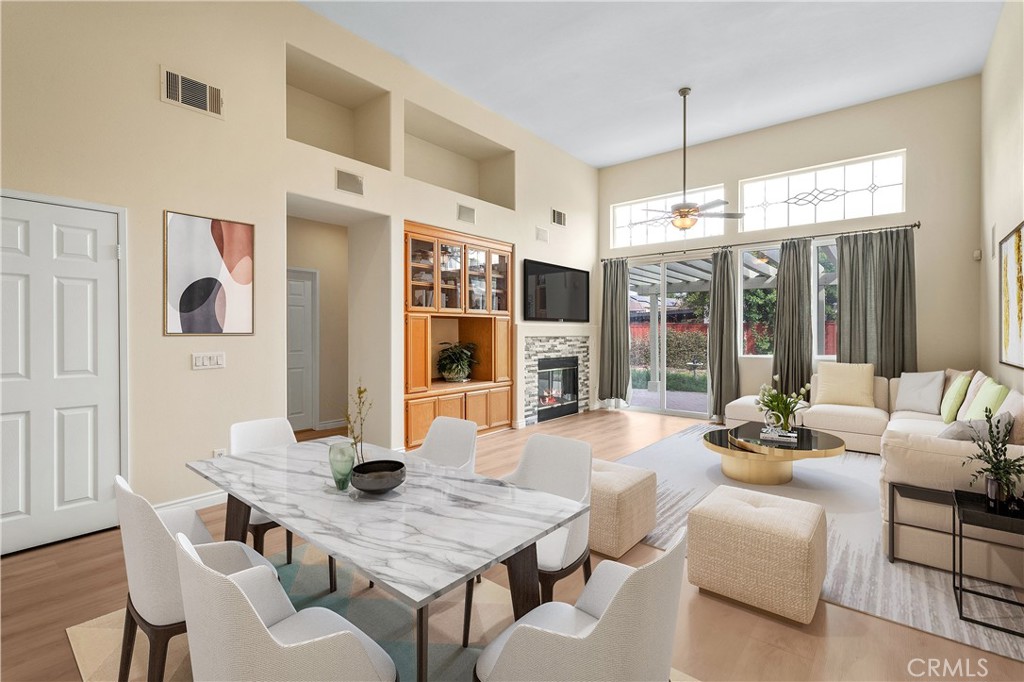 a dining room with furniture and window