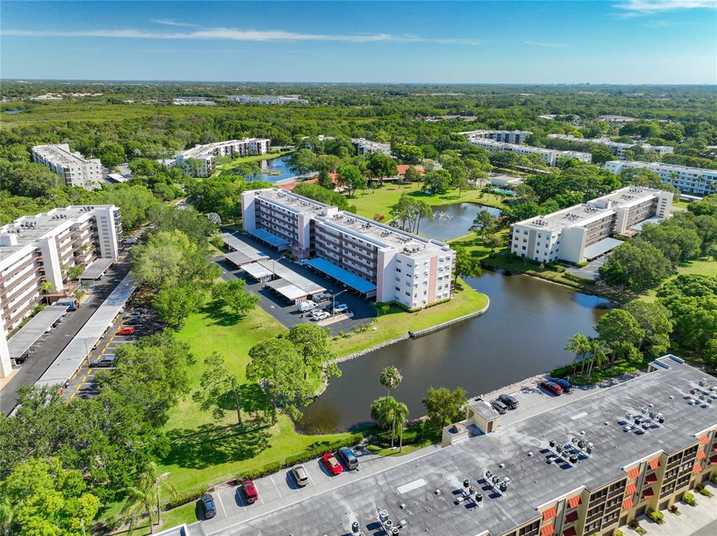 Aerial view of Tiffany Buidling surrounded by lush landscaping and ponds.