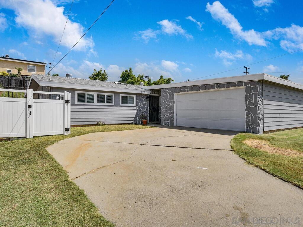 a front view of a house with a garage