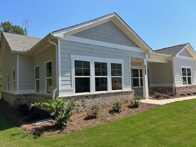 front view of a house with a yard