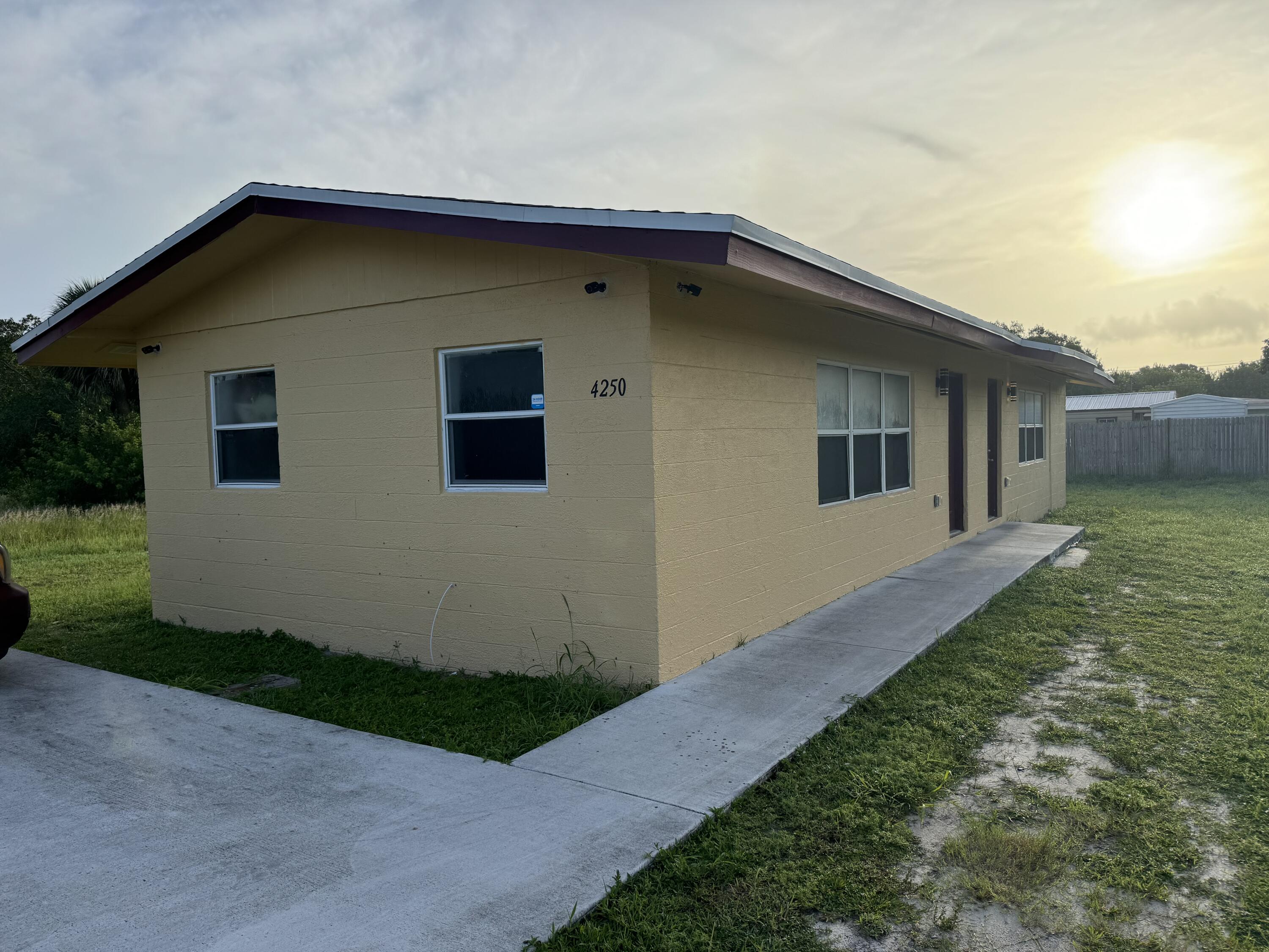 a house with yard in front of it