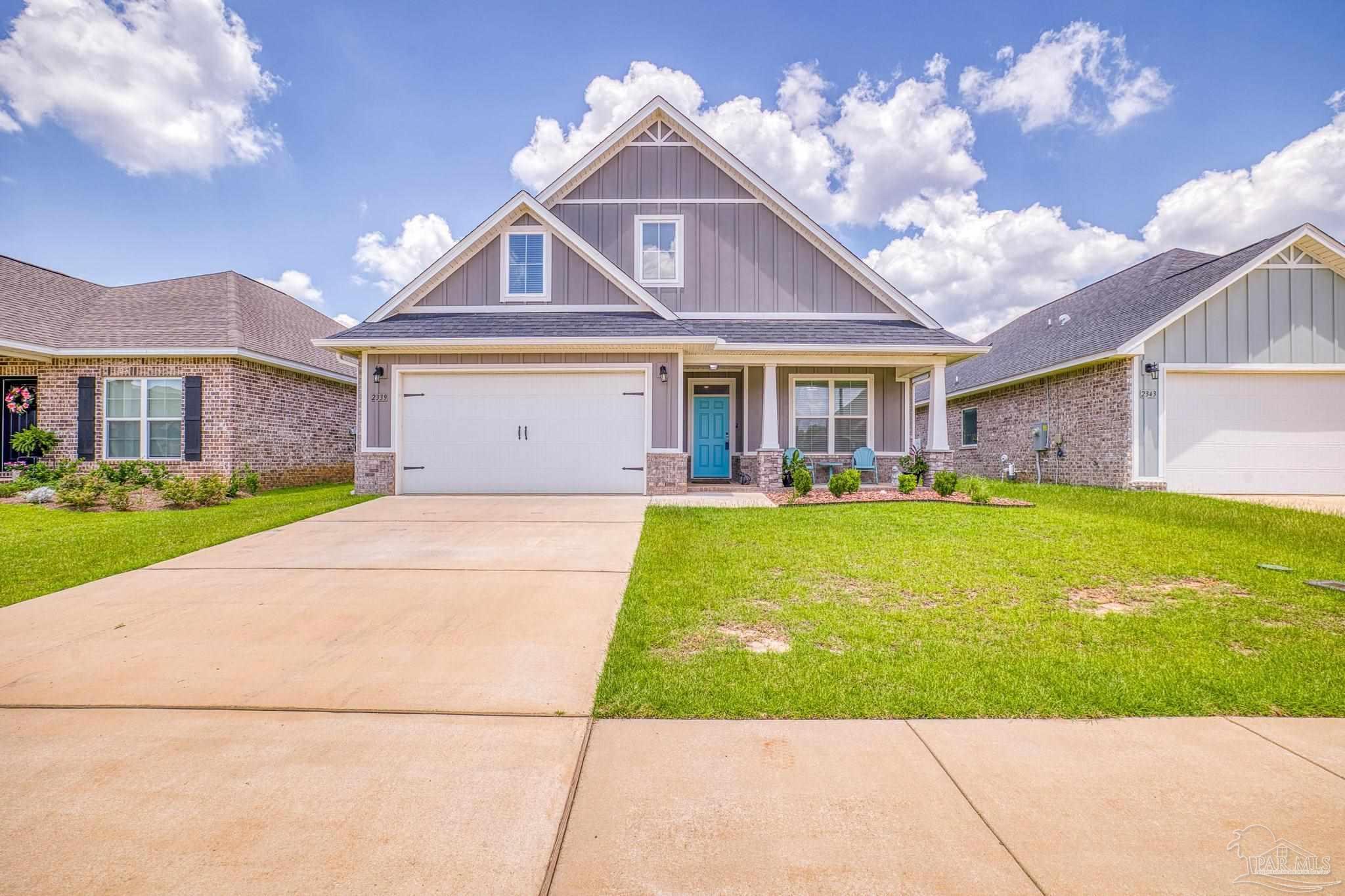 a front view of house with yard