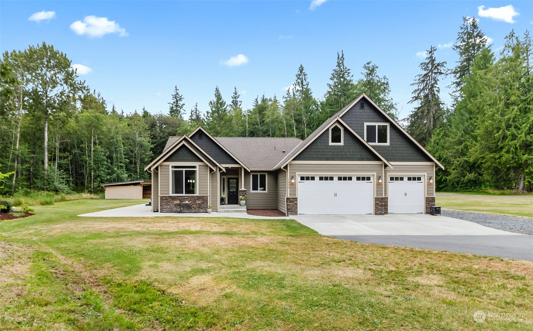 a house with trees in the background