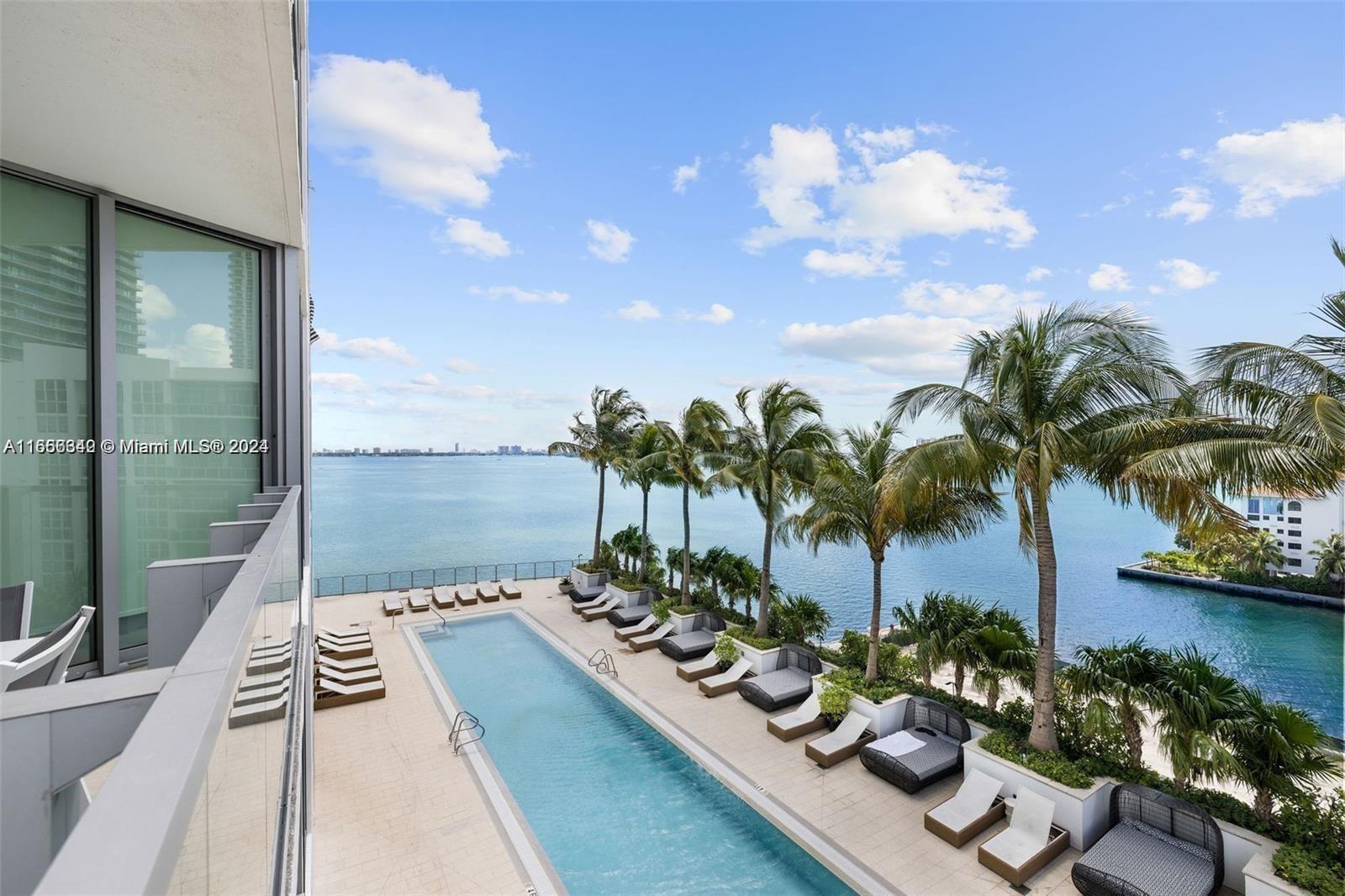 a view of a house with a ocean view