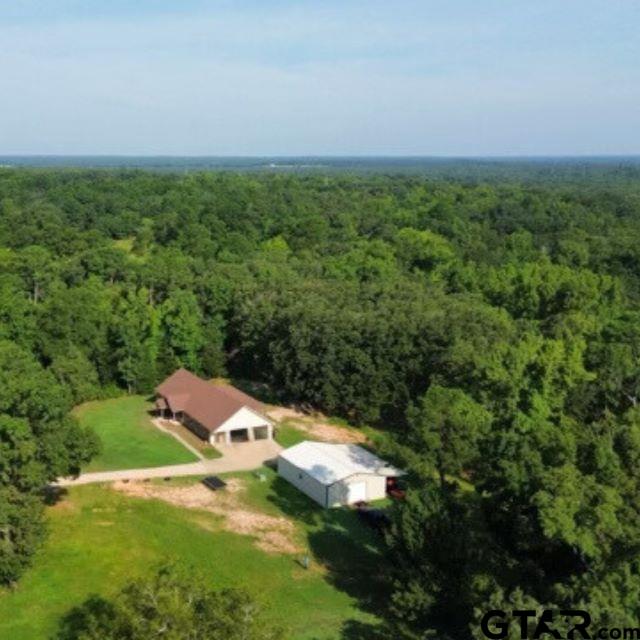 an aerial view of residential house with outdoor space