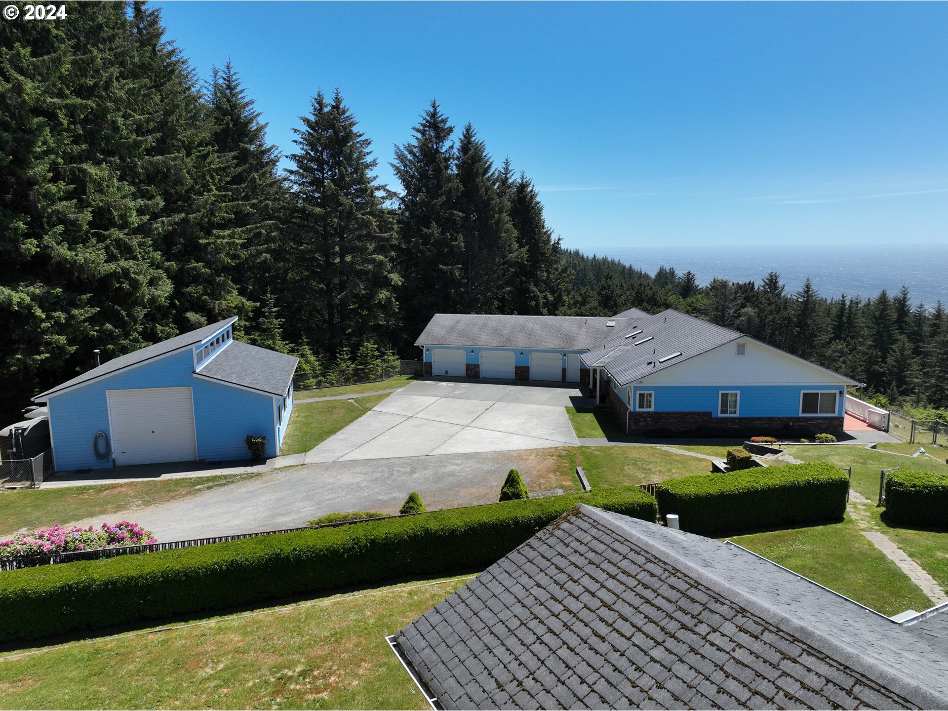 a aerial view of a house with garden