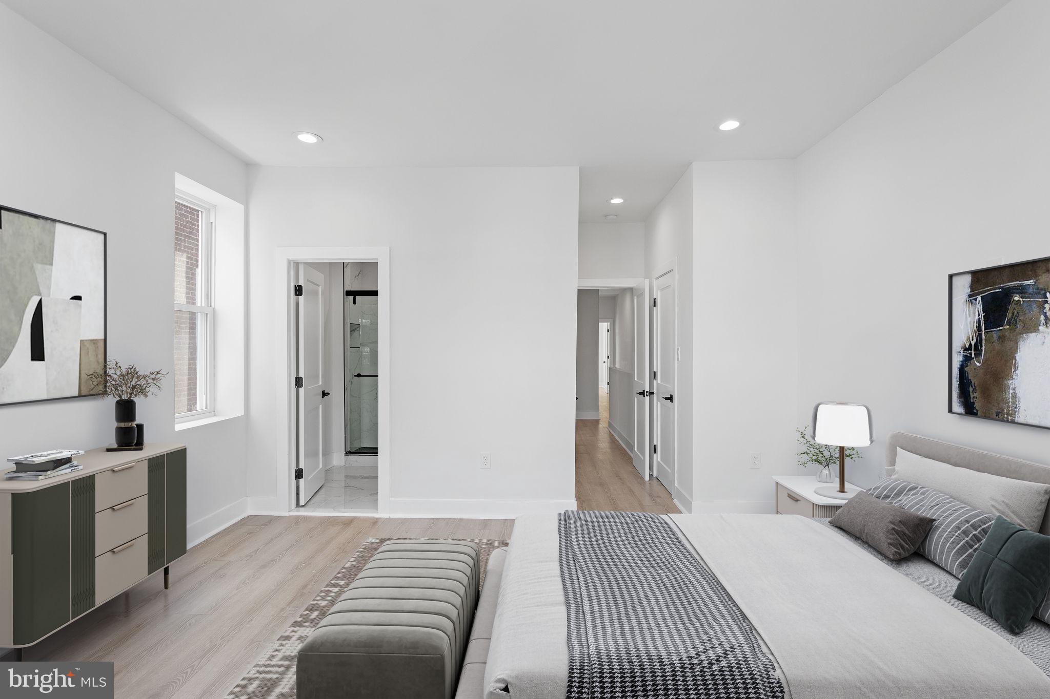 a bedroom with a bed and a view of bathroom