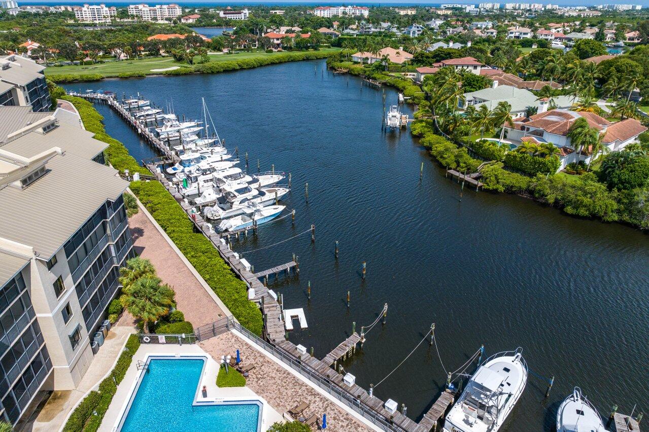 an aerial view of a house with a lake view