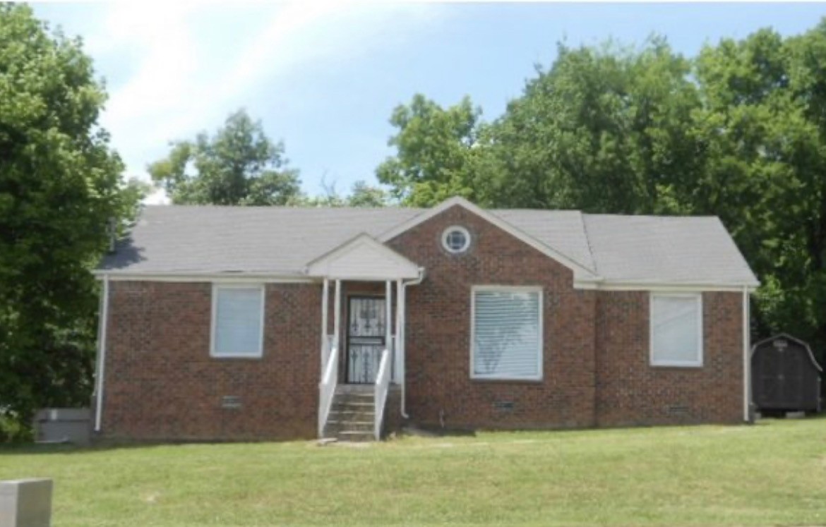 front view of house with a yard