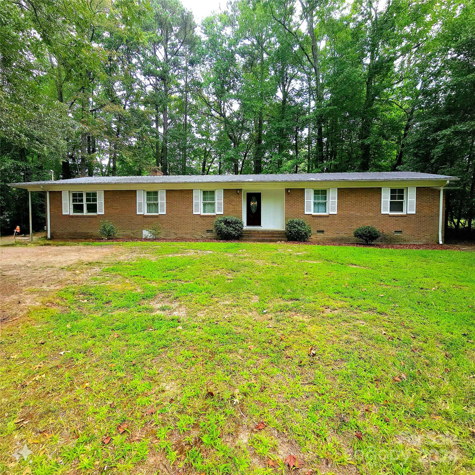 front view of a house and a yard