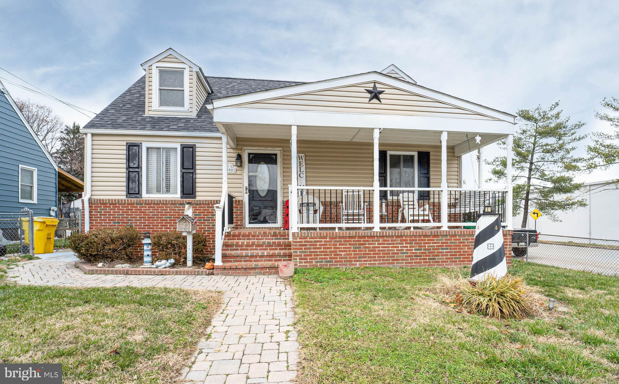 front view of a house with a yard