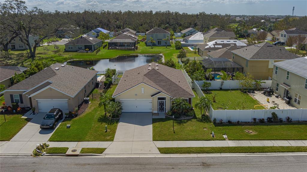 an aerial view of a house with a garden