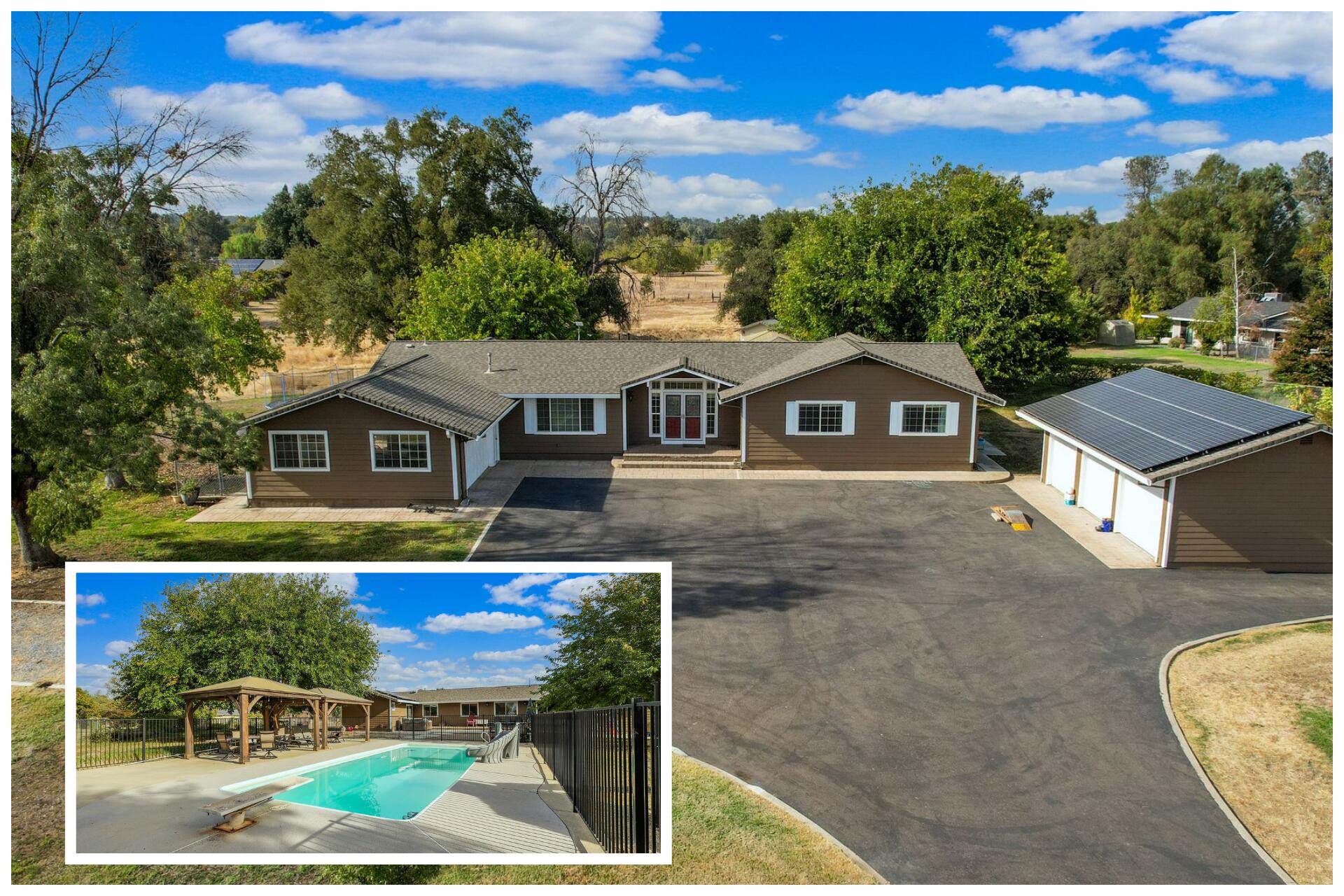 a aerial view of a house with a yard