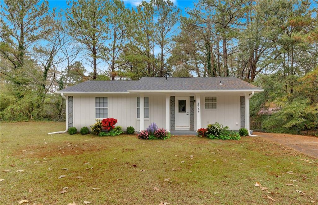 a front view of house with yard