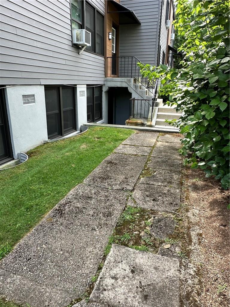 View of yard featuring cooling unit