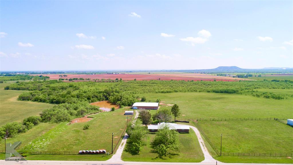 a view of a lake from a yard