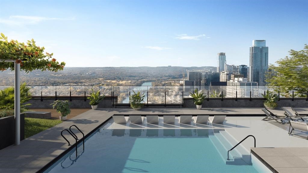 a view of houses with a swimming pool