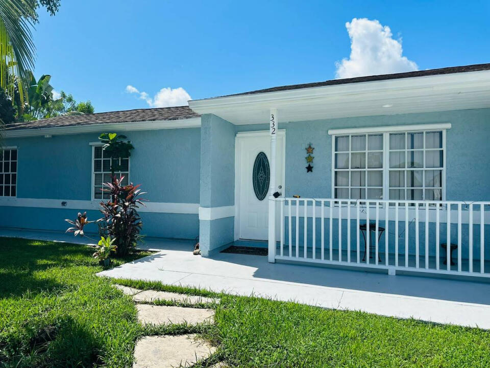 a front view of a house having yard