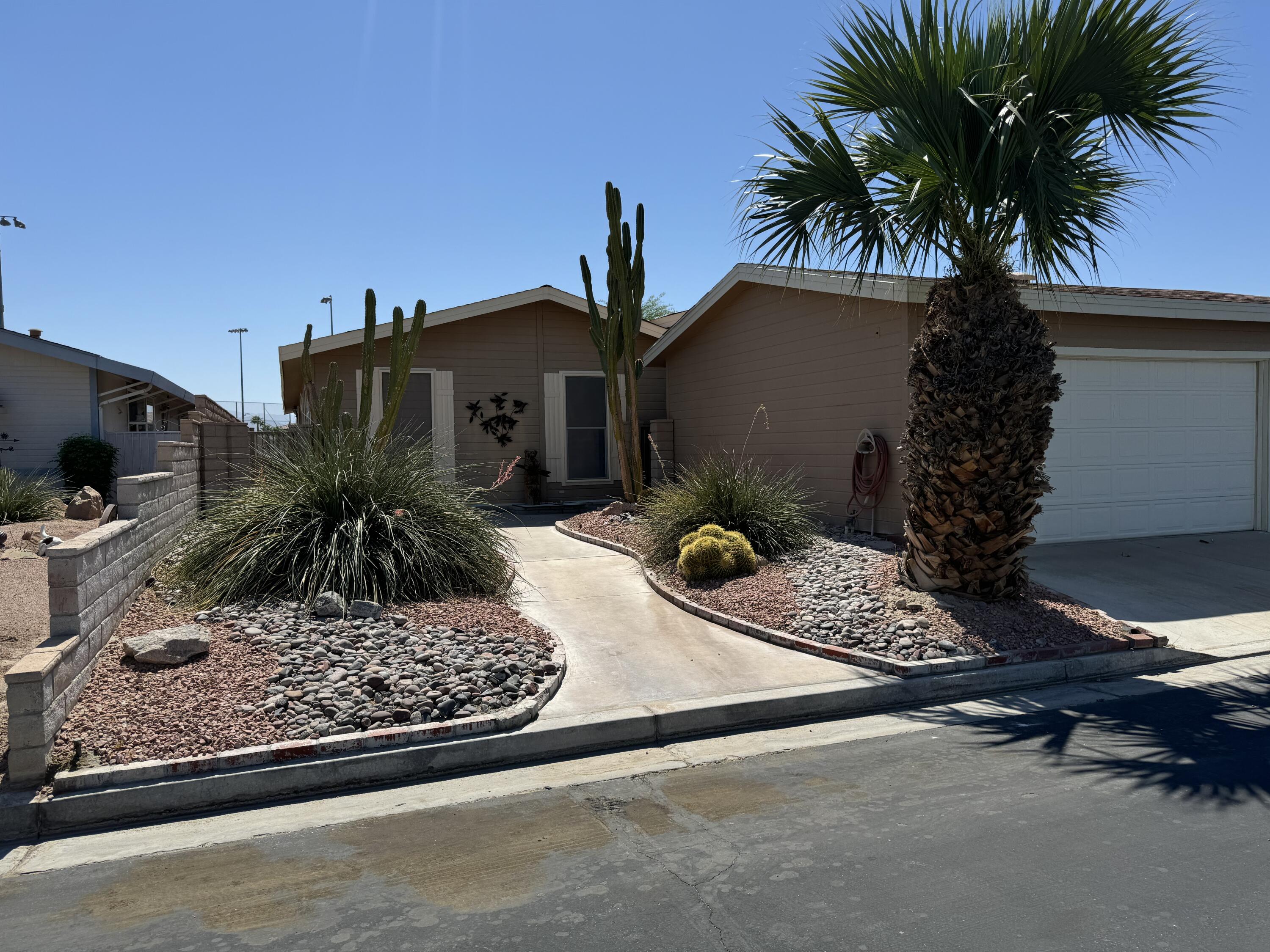 a view of a house with a patio