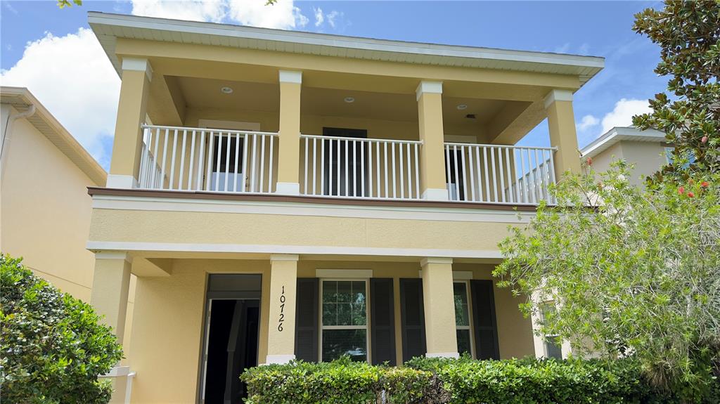 a front view of a house with a porch