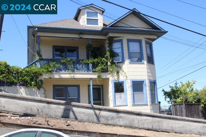 a front view of a house with yard