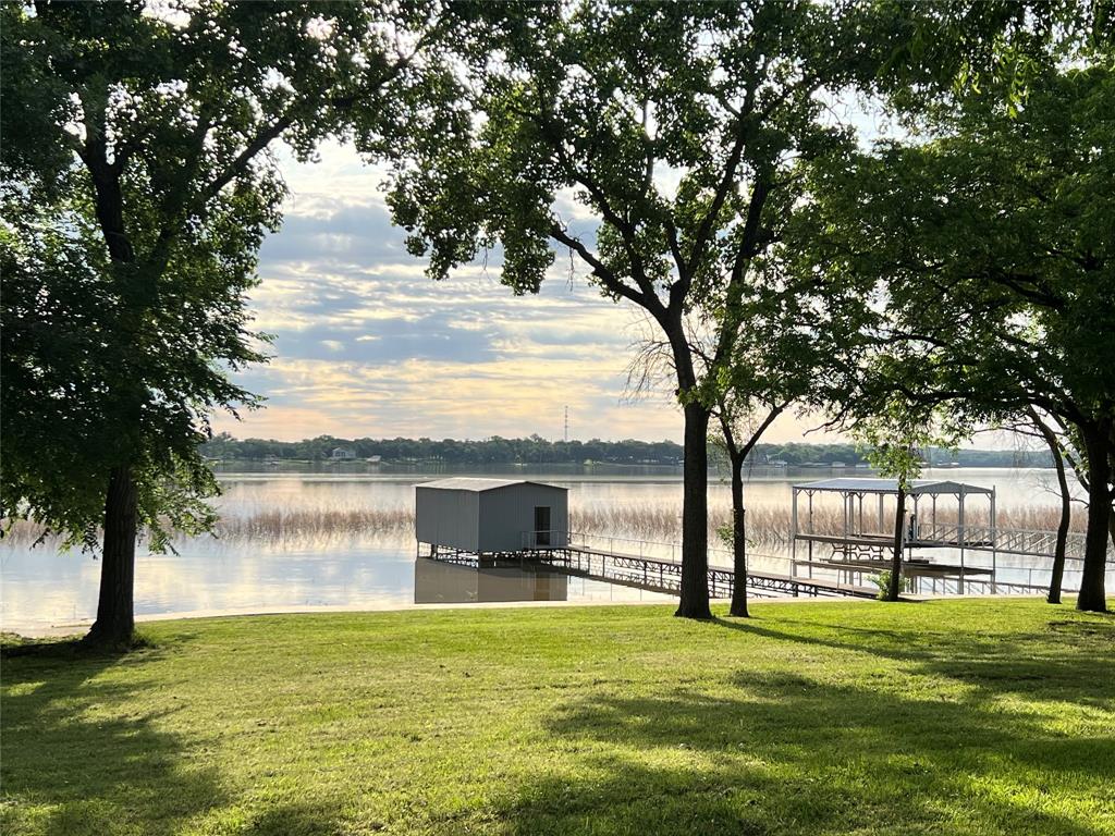 a view of a lake view with a garden