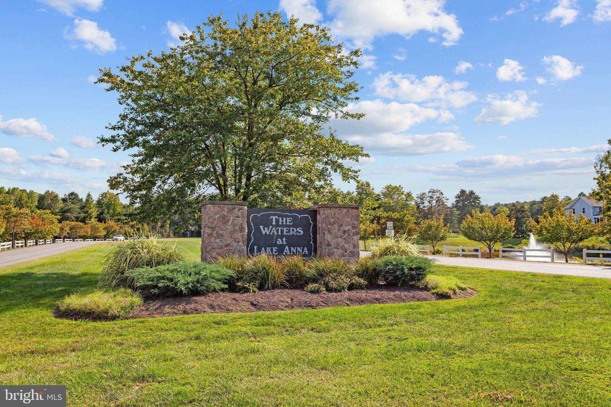 a view of a garden with a building in the background