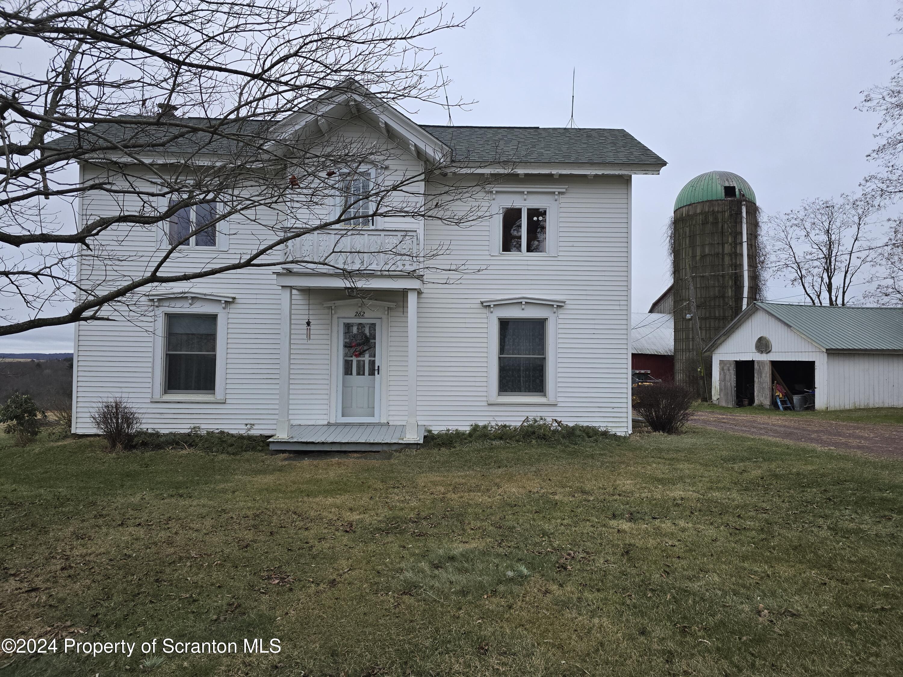 a front view of house with yard